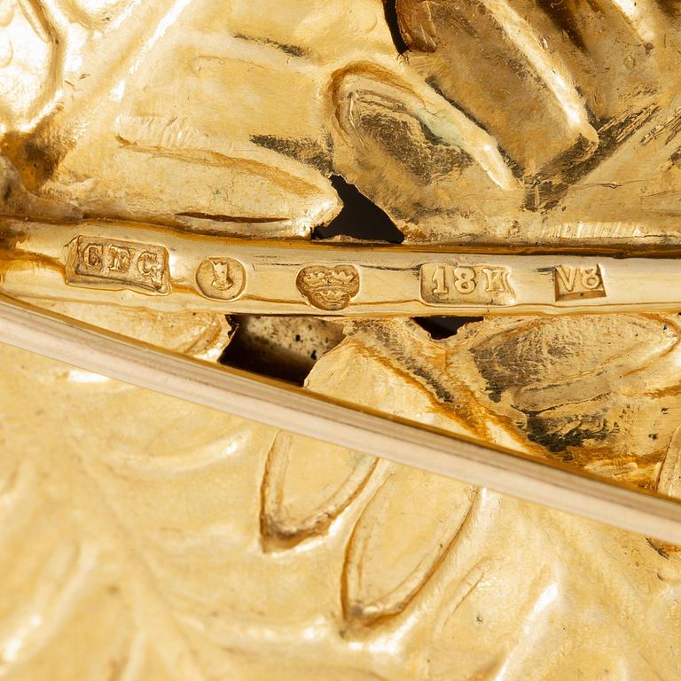 CF Carlman brosch 18K guld med en emaljerad silverorm.