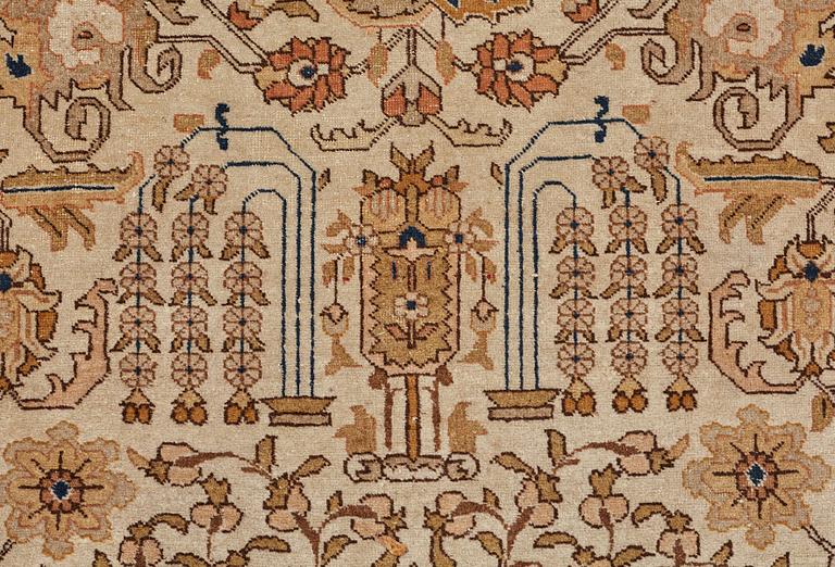 A CARPET, a semi-antique Tabriz, ca 593,5 x 398,5 cm, signed Nämatzade.