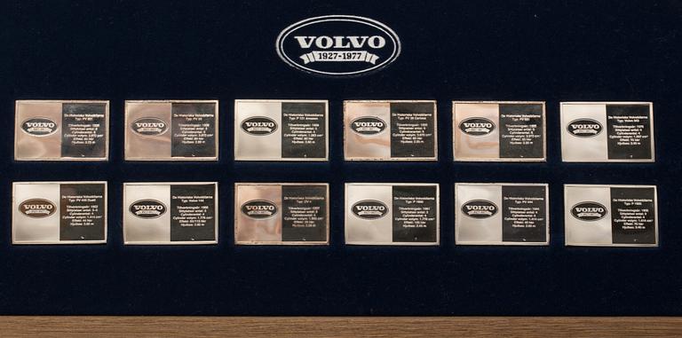 PLAKETTER, 12 st, "Volvo 1927-1977", sterlingsilver, vikt 226 g.