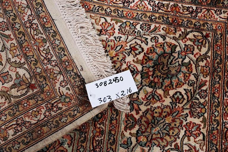 A carpet, silk Kashmir, ca 303 x 216 cm.