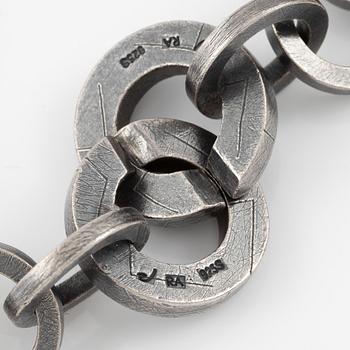 Bracelet, necklace, a pair of earrings, and a ring, Pia Rauff, silver with small diamonds.