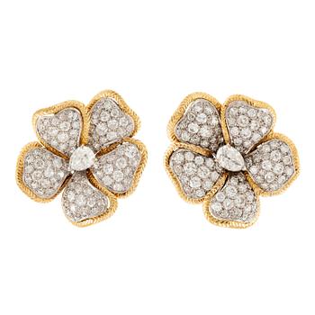 642. A pair of earrings in 18K gold and white gold set with old-, round brilliant and eight-cut diamonds.