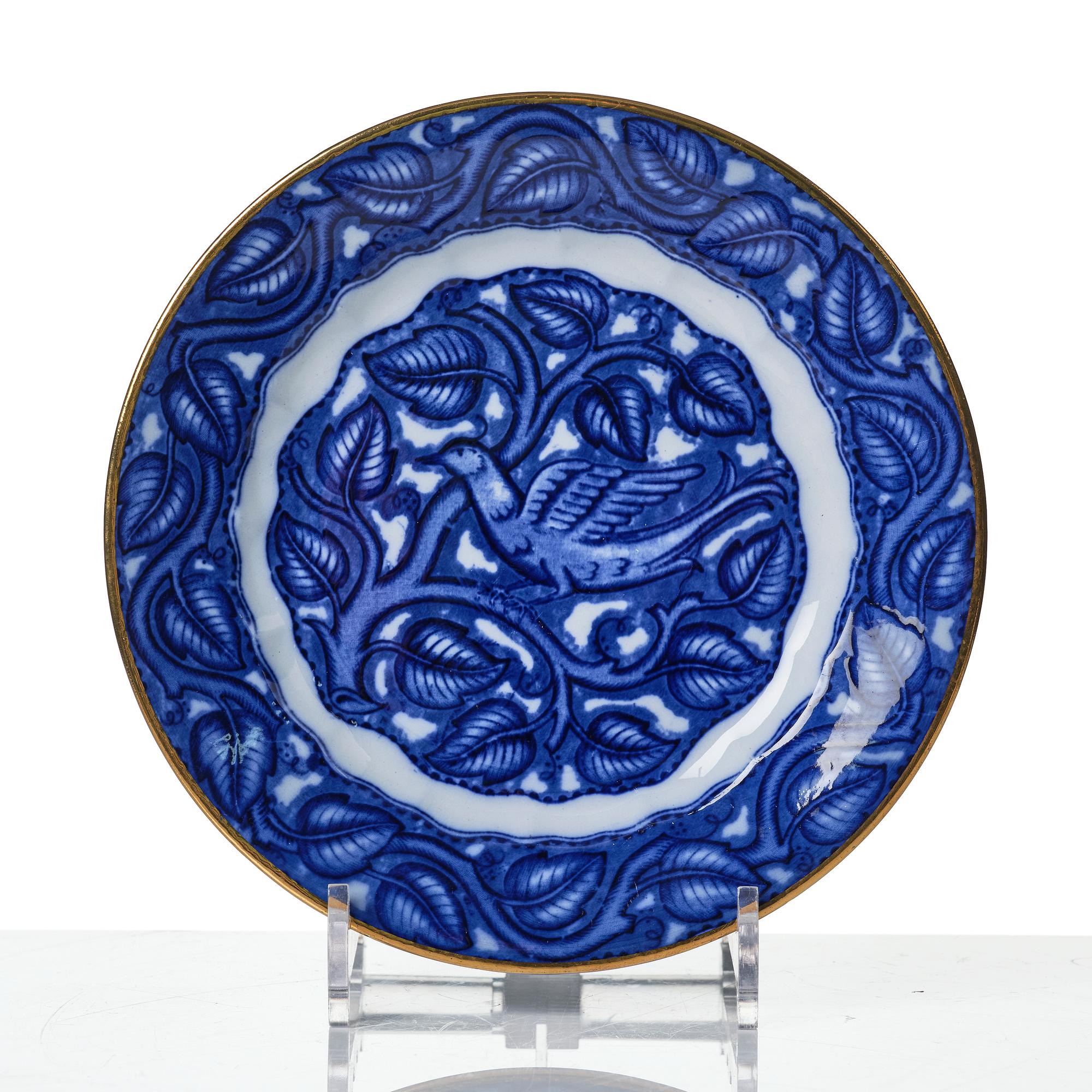 Wilhelm Kåge, mattallrikar samt fat, 16 delar, flintgods och porslin, "Fågel Blå", Gustavsberg, i produktion 1932-33.