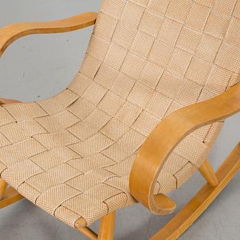 A 1940s possibly Yngve Ekstrom rocking chair.