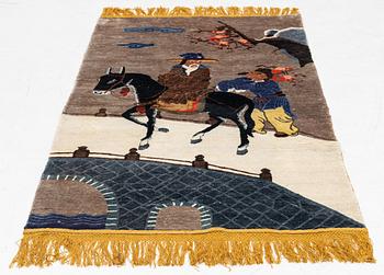 A rug, figural, silk, China, approx. 186 x 94 cm.