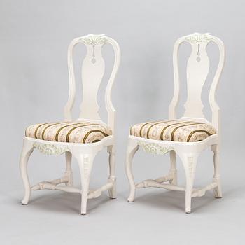 A pair of Rococo style armchairs, a pair of chairs, and a table, mid 20th century.