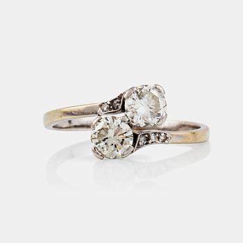 1323. A brilliant-cut diamond ring, set with two diamonds total carat weight circa 1.40 cts.