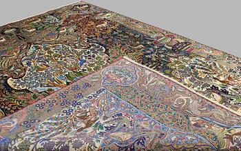 A Kashmar figural carpet. Circa 390 x 300 cm.