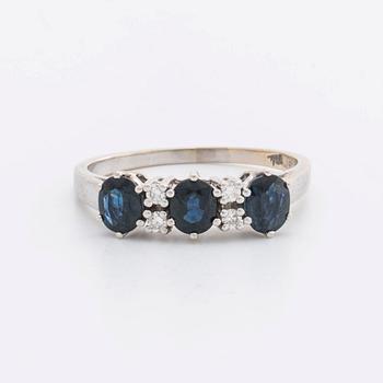 RING 18k whitegold w 3 sapphires 5 x 4 mm and 4 brilliant-cut Diamonds 0,12 ct in total engraved.