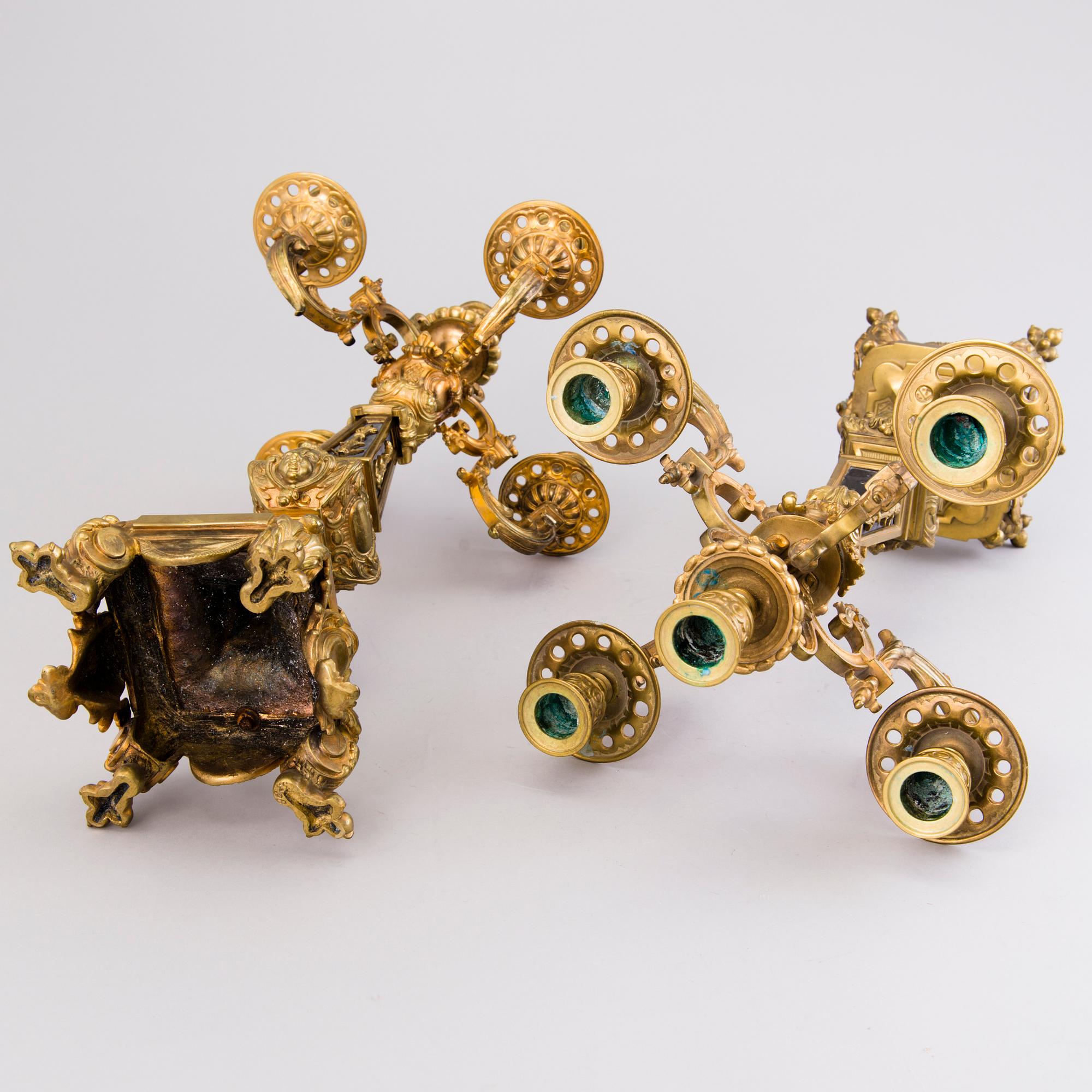 A pair of bronze candelabra from the latter half of the 19th Century.