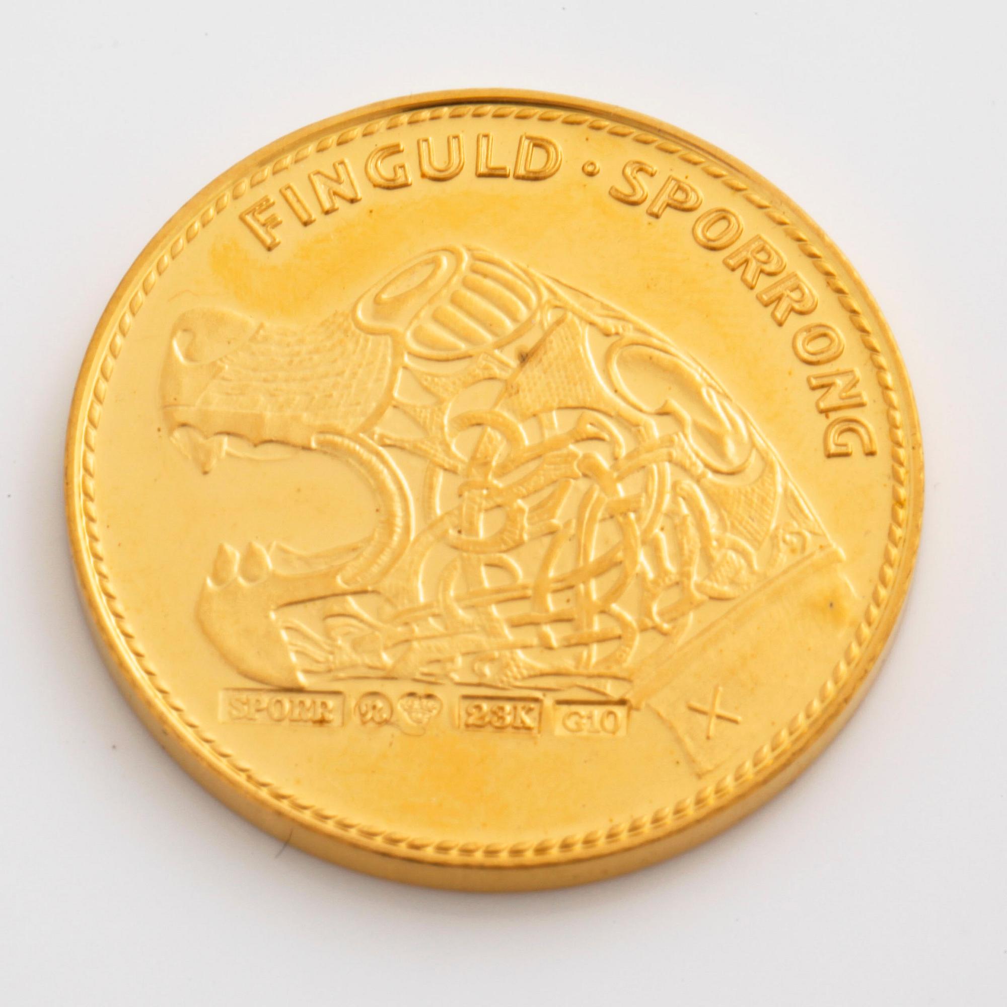 A gold coin from Sporrong, 1981, weight 25 g.