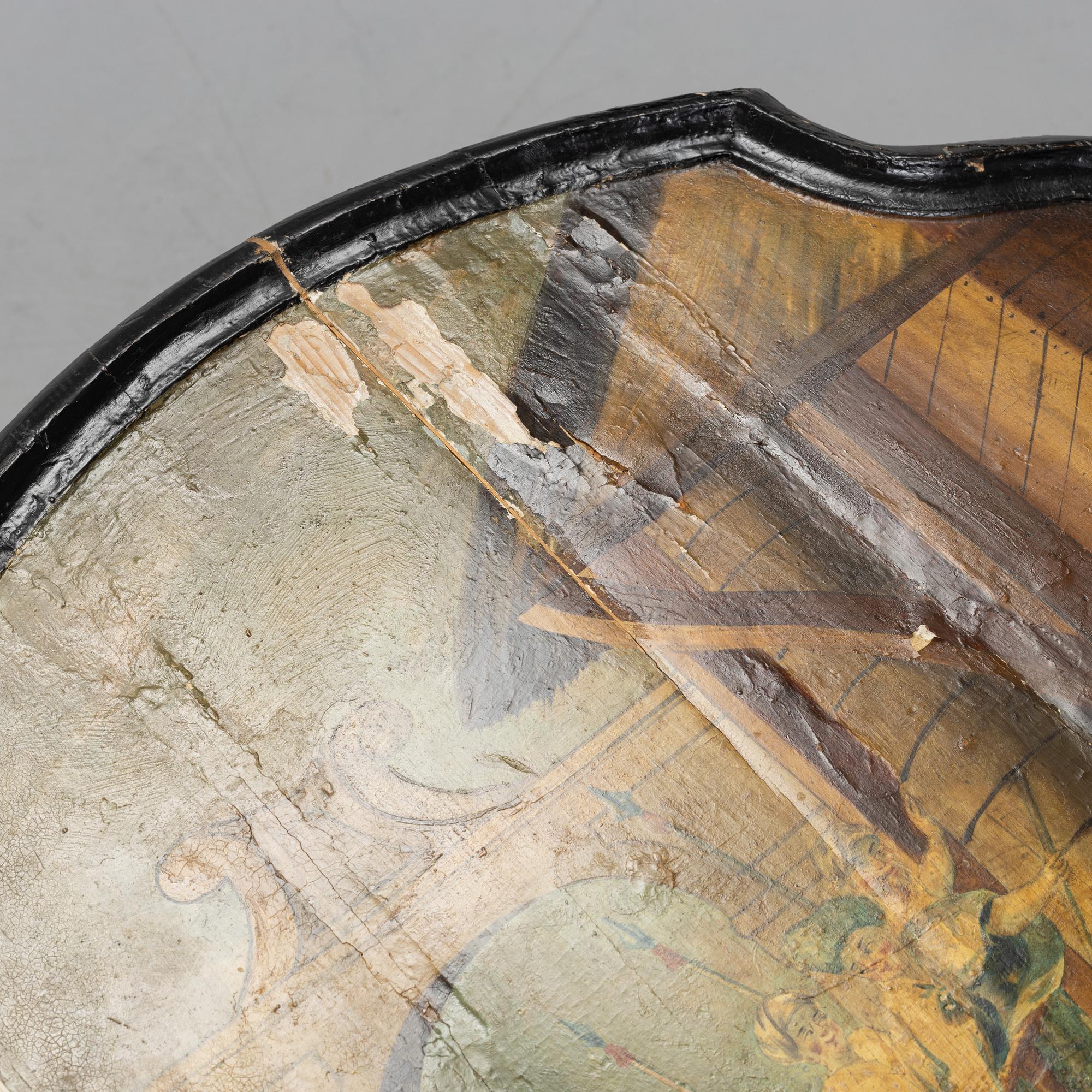 A transitional drop-leaf table, mid 18th Century.