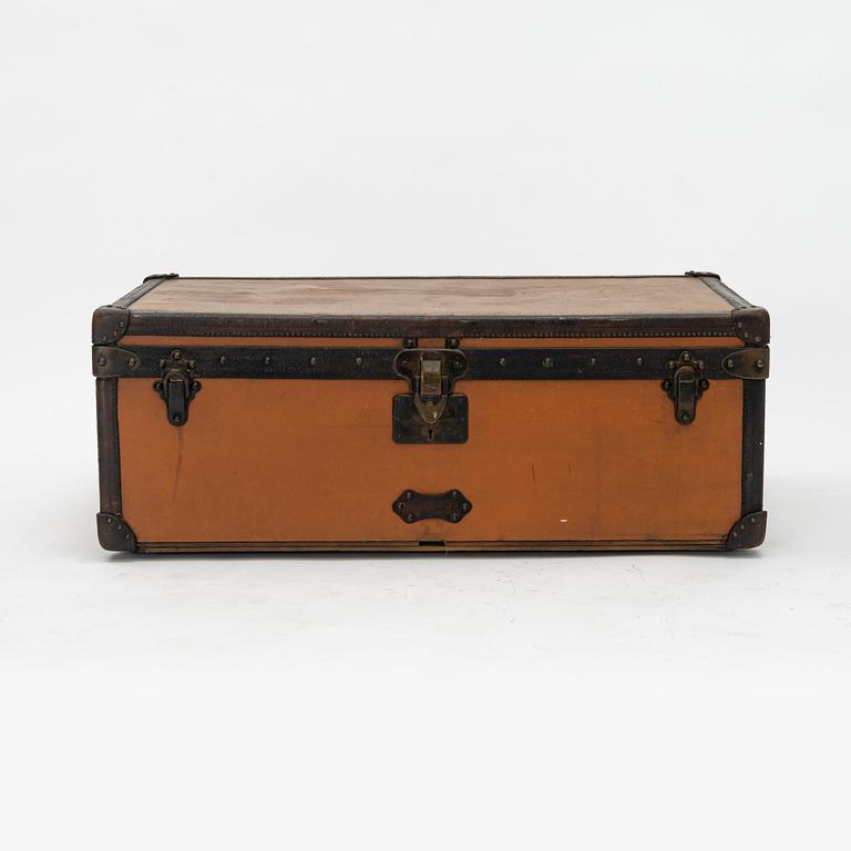 Louis Vuitton, orange Steem Trunk from the early 20th century.