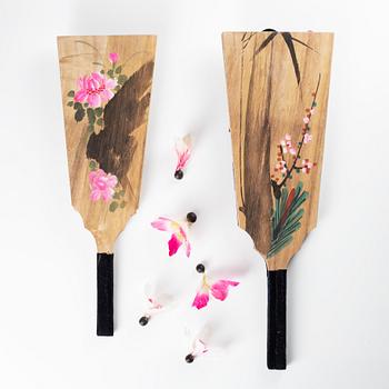 A set of two Japanese hagoita wooden paddles and five shuttlecocks, first part of 20th century.