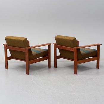 A pair of 'Kubus' easy chairs by Gerhard Berg for Stokke, Norway.