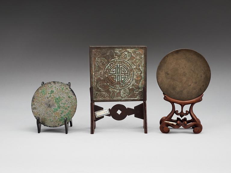 A set of three bronze mirrors, Ming dynasty and later.