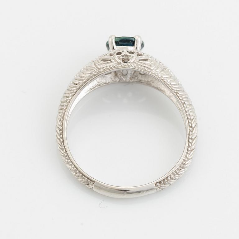 White gold and sapphire ring.