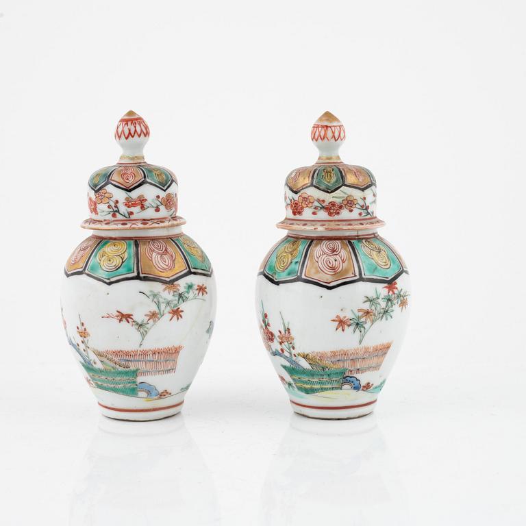 A pair of Japanese jars with covers, circa 1900.