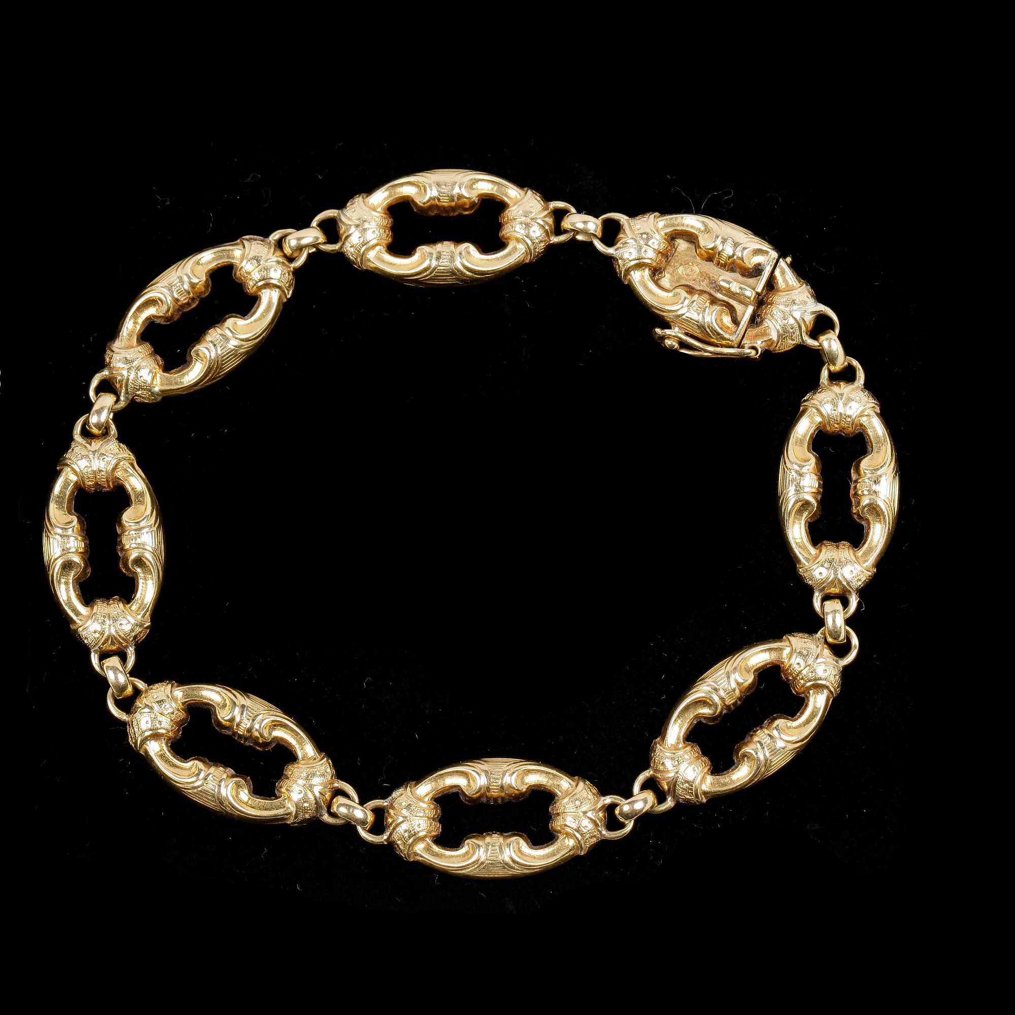 ARMBAND, 18k guld. Omkring 1800/1900. Vikt 11,7g.