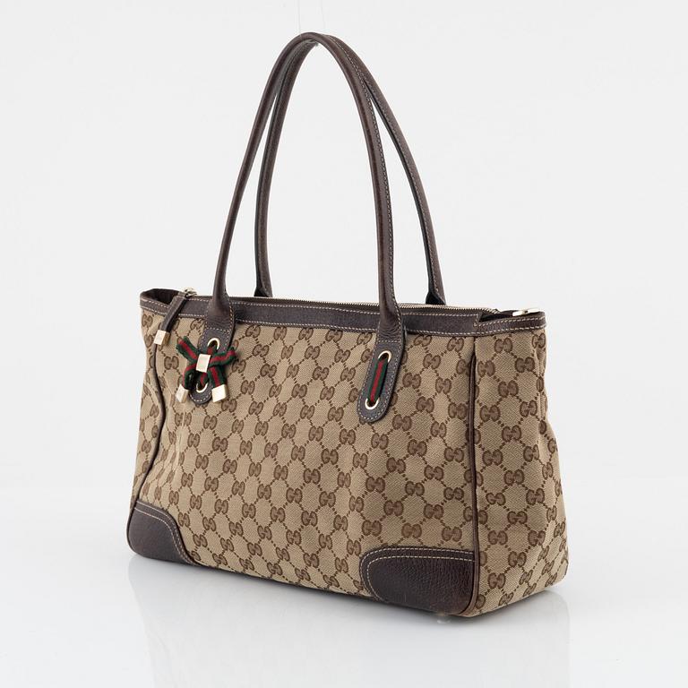 Gucci, a monogram canvas handbag.