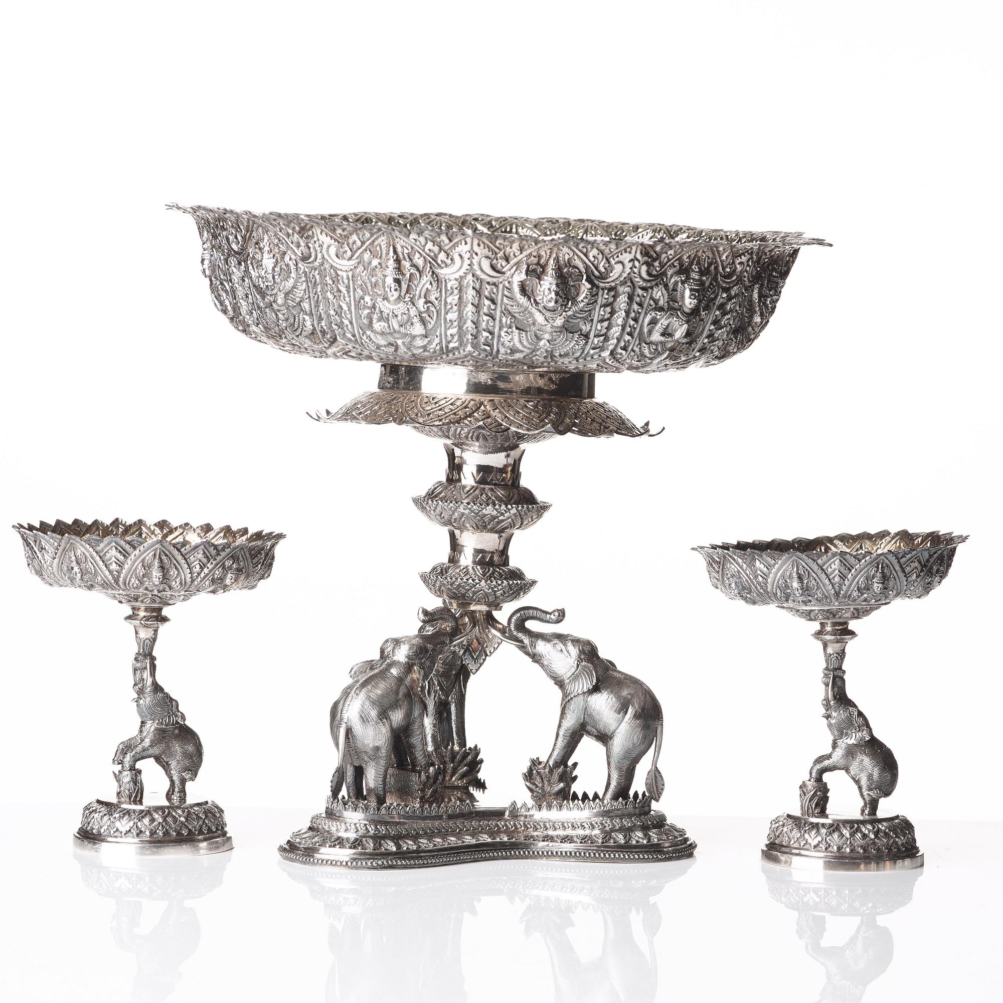 A three piece silver garniture, Thailand, circa 1900.