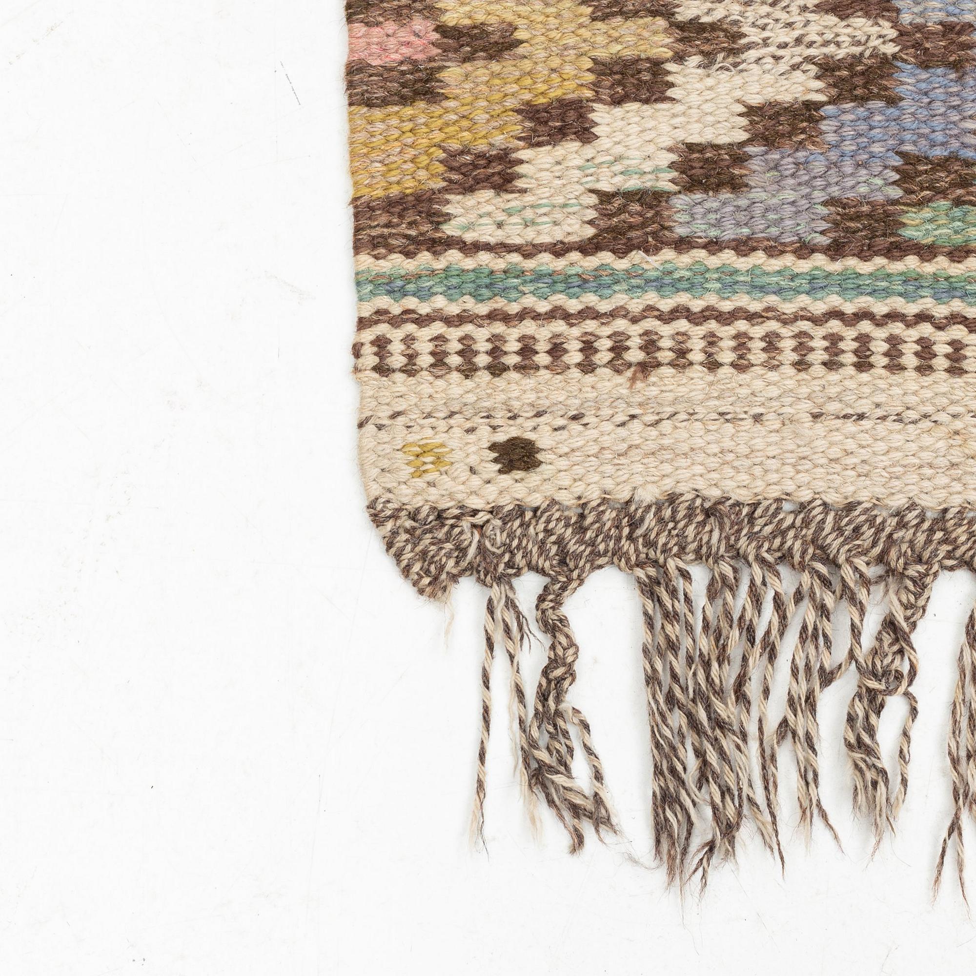 a carpet, "Vit botten", flat weave, ca 241 x 120 cm, signed AB MMF.