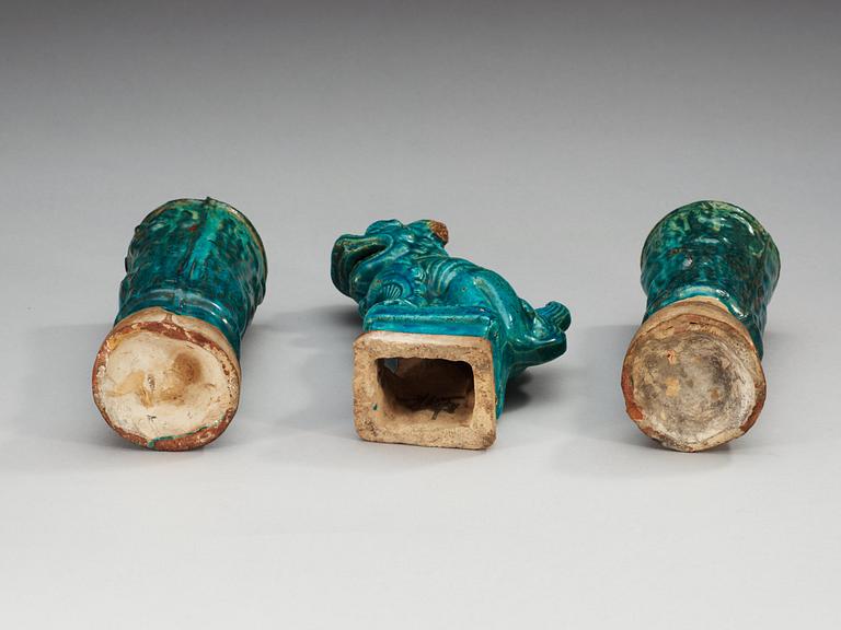 A set of two turquoise glazed altar vases and a Buddhist lion, Ming dynasty (1368-1644).