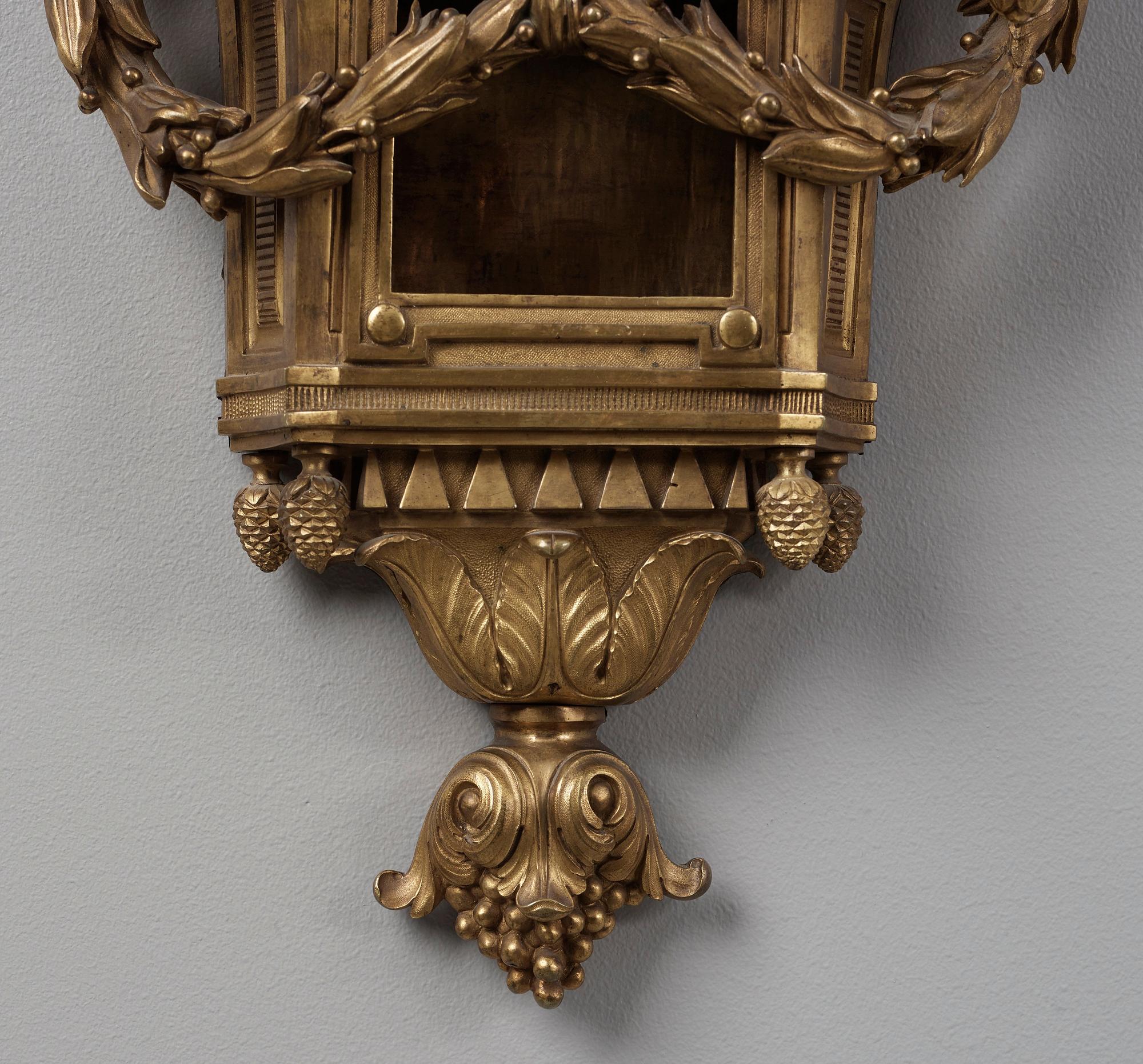 A Louis XVI late 18th century gilt bronze wall clock.
