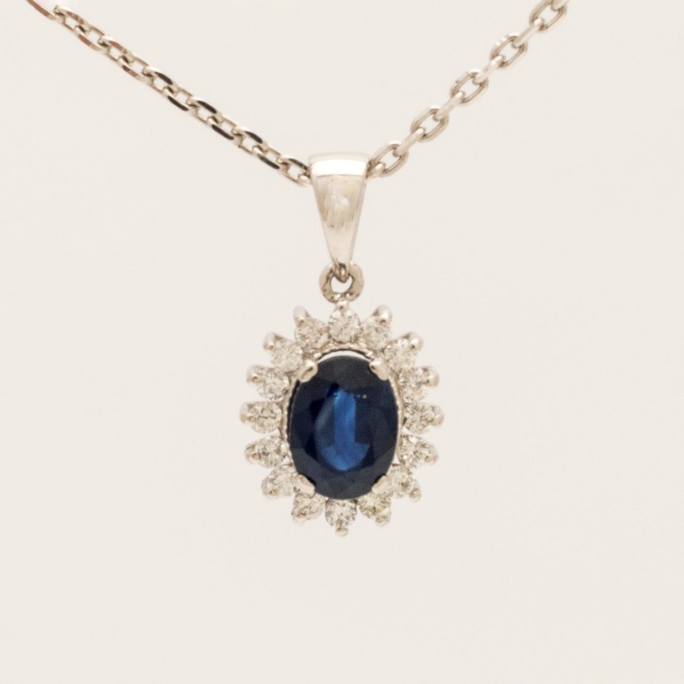 Necklace, 18K white gold with diamonds and sapphire.