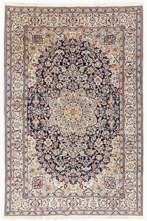 A Nain carpet, part silk, c 305 x 206 cm.