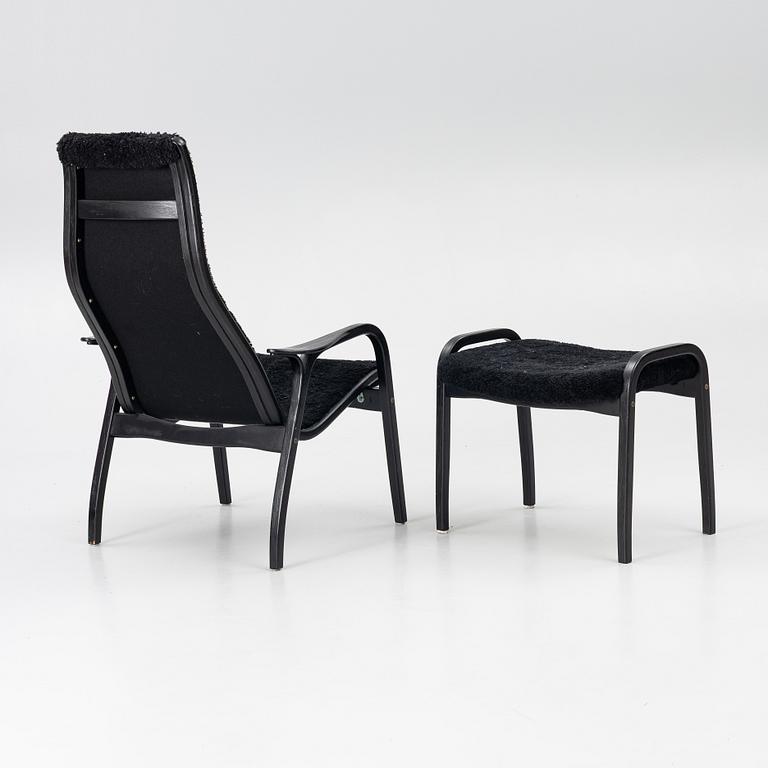 Yngve Ekström, a 'Lamino' easy chair with foot stool, Swedese 2010.