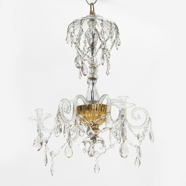 A European glass three-light chandelier, circa 1800.