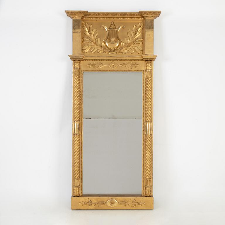 An Empire mirror, first half of the 19th Century.