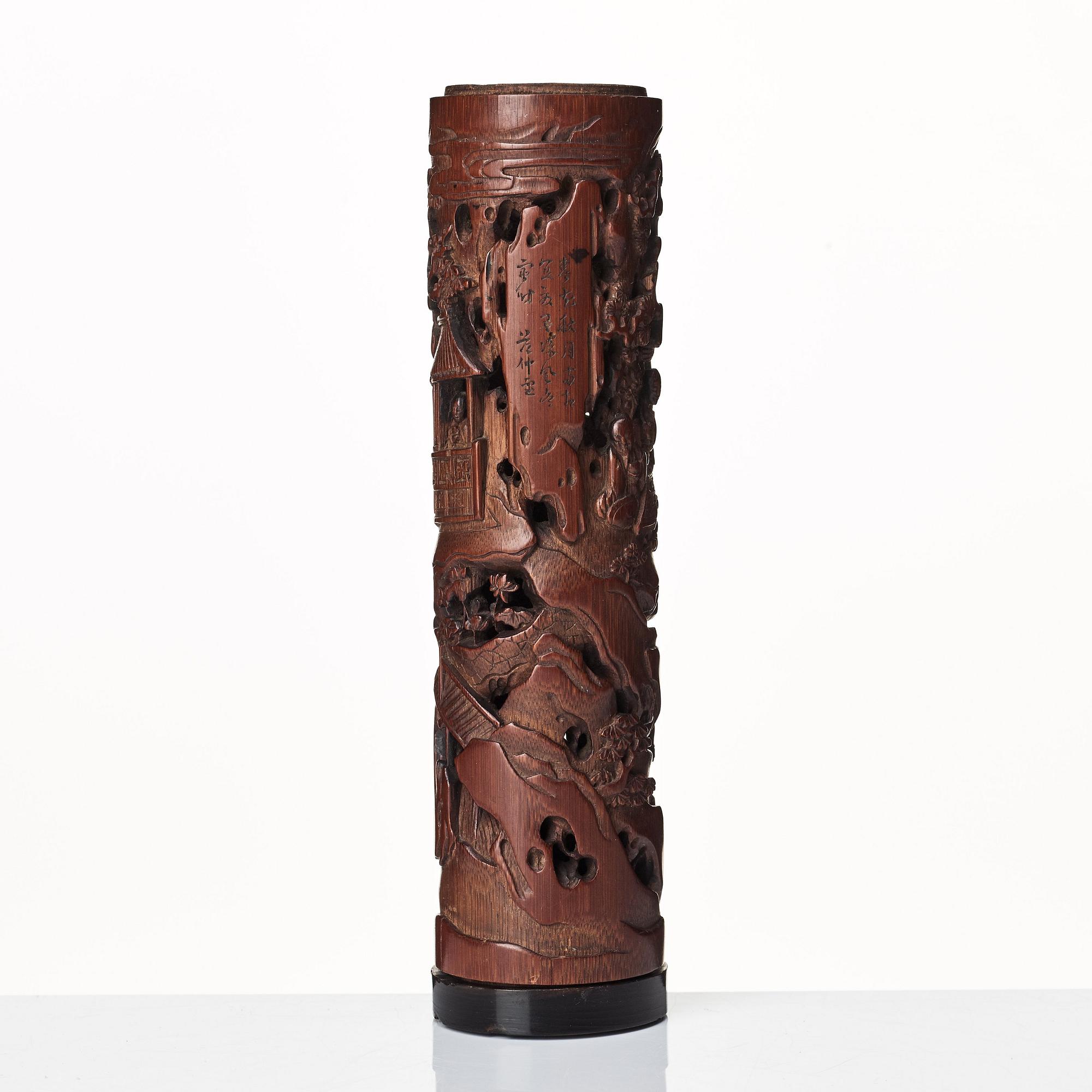 A carved cylindrical bambo parfumier, Qing dynasty, 19th Century.