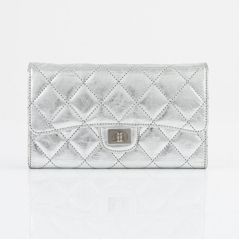 Chanel, a quilted silver leather wallet, 2006-08.
