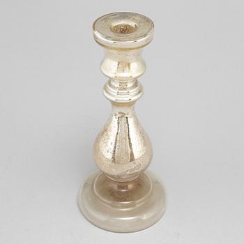 A 19th century glass candlestick.
