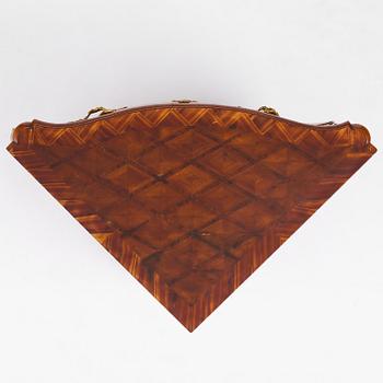 A Swedish parquetry rococo corner-commode, Stockholm later part 18th century.