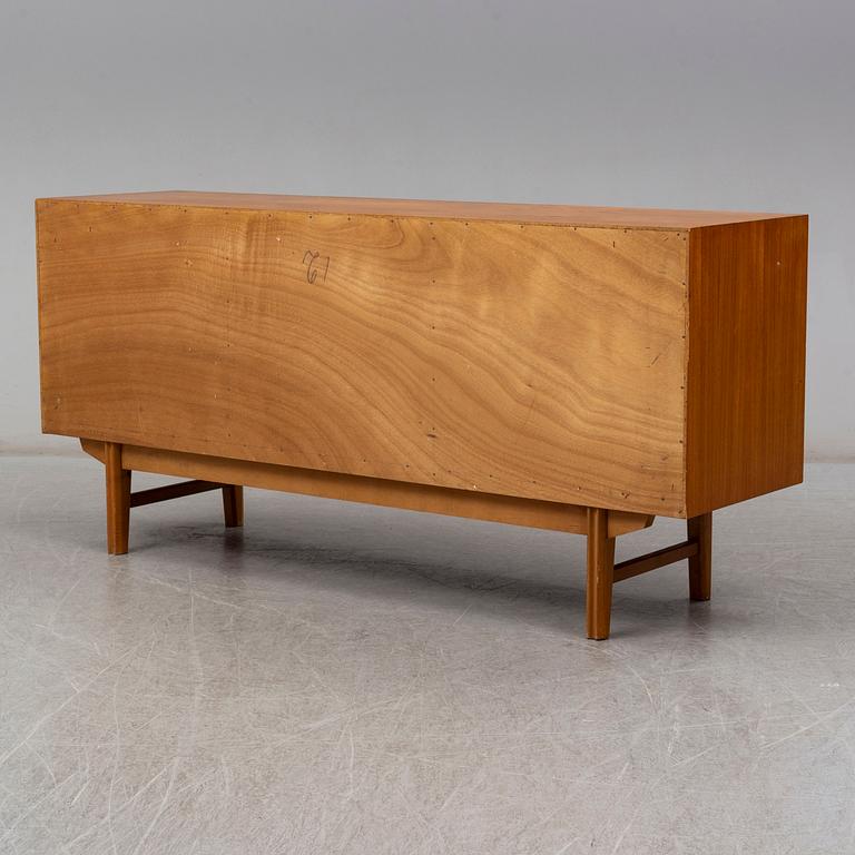 A 1950/60s teak veneered sideboard.