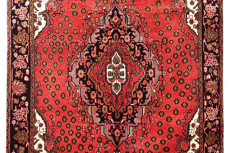 An Azerbaijan carpet, c. 306 x 208 cm.