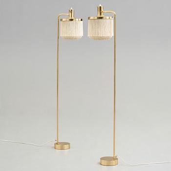 Hans-Agne Jakobsson, a pair of brass floor lamps, Markaryd, Sweden 1960-70's.