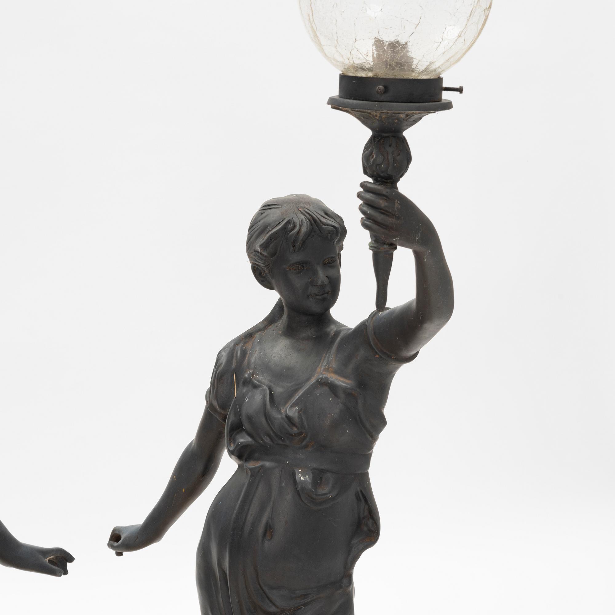 A pair of lamps, 20th Century.