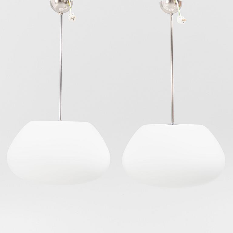 A pair of ceiling lamps, contemporary.