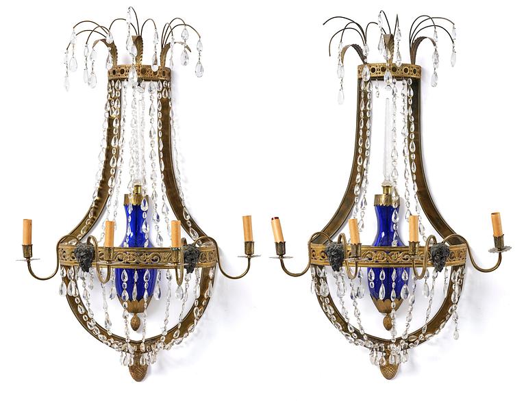 A pair of Russian Louis XVI-style  four-branch gilt bronze appliques, 19th century.