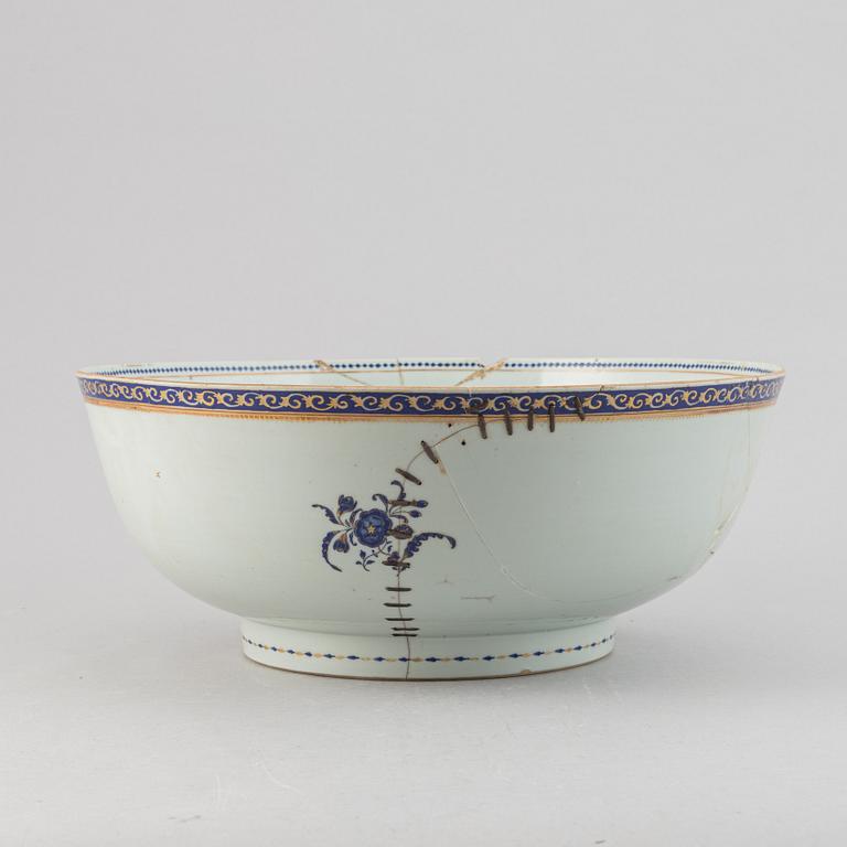Two large famille rose and gilt punch bowls, Qing dynasty, 18th century.