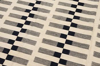 A flat-woven rug, c. 232 x 175 cm.