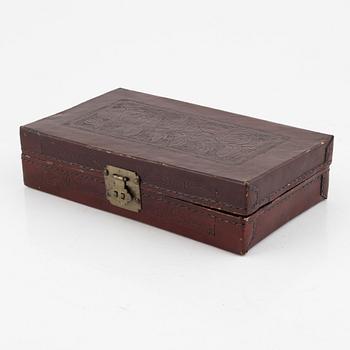 A Chinese leather box, late Qing dynasty.