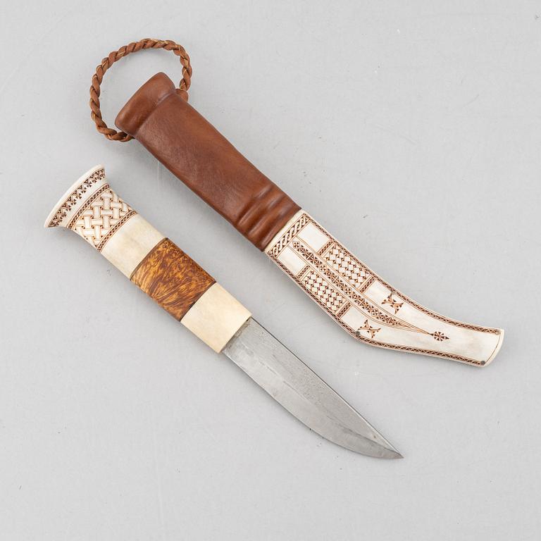 Folke Fjällström, a reindeer antler knife, signed.