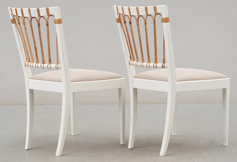 A pair of Josef Frank white lacquered chairs, Svenskt Tenn, model 1165.