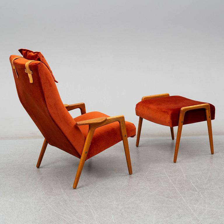 YNGVE EKSTRÖM, a 'Ruster' easy chair with foot rest.