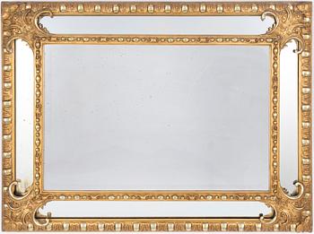 A gilt gesso mirror, late 19th century.